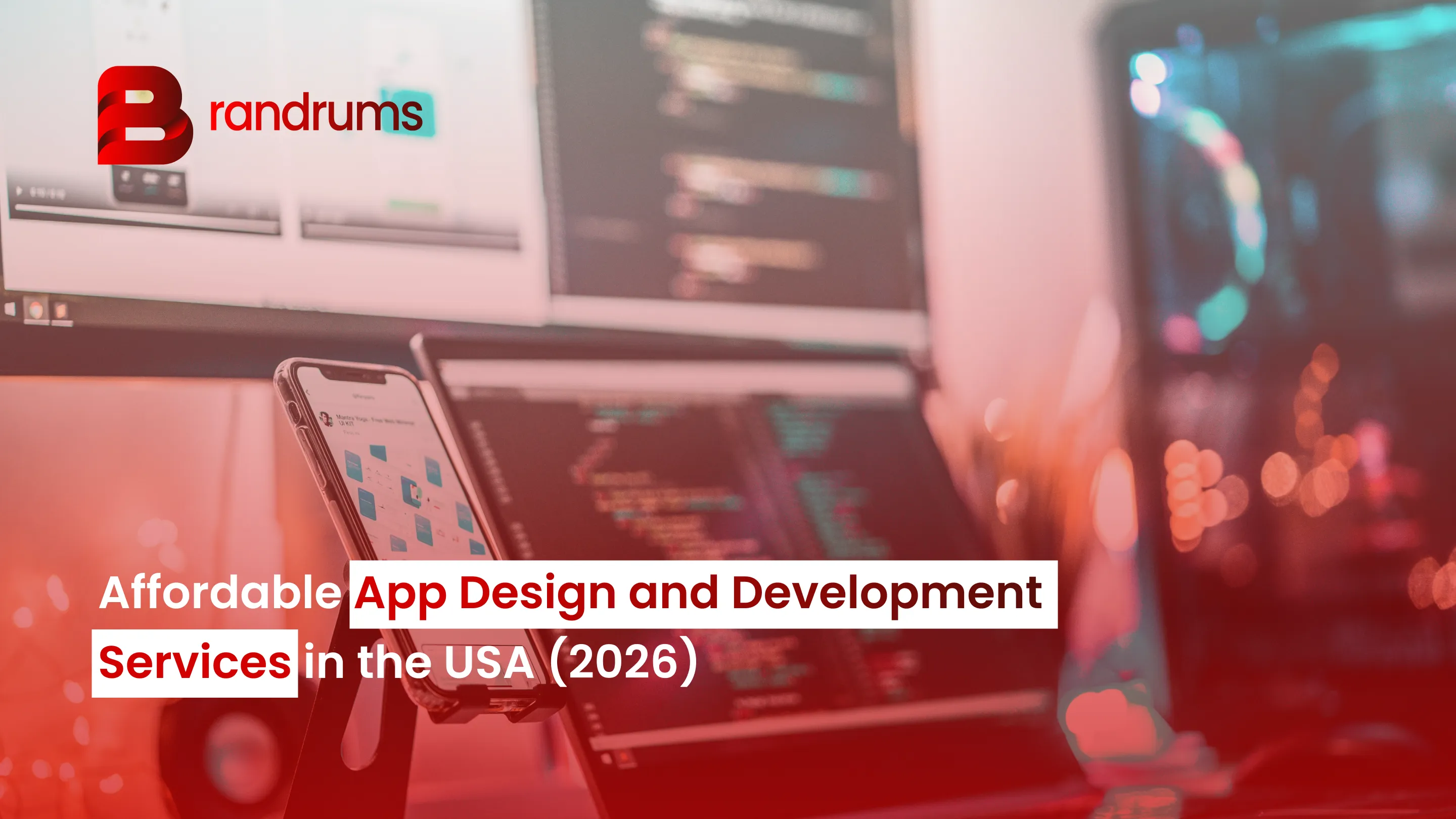 US founder reviewing a mobile app wireframe with a development team in a 2026 workspace