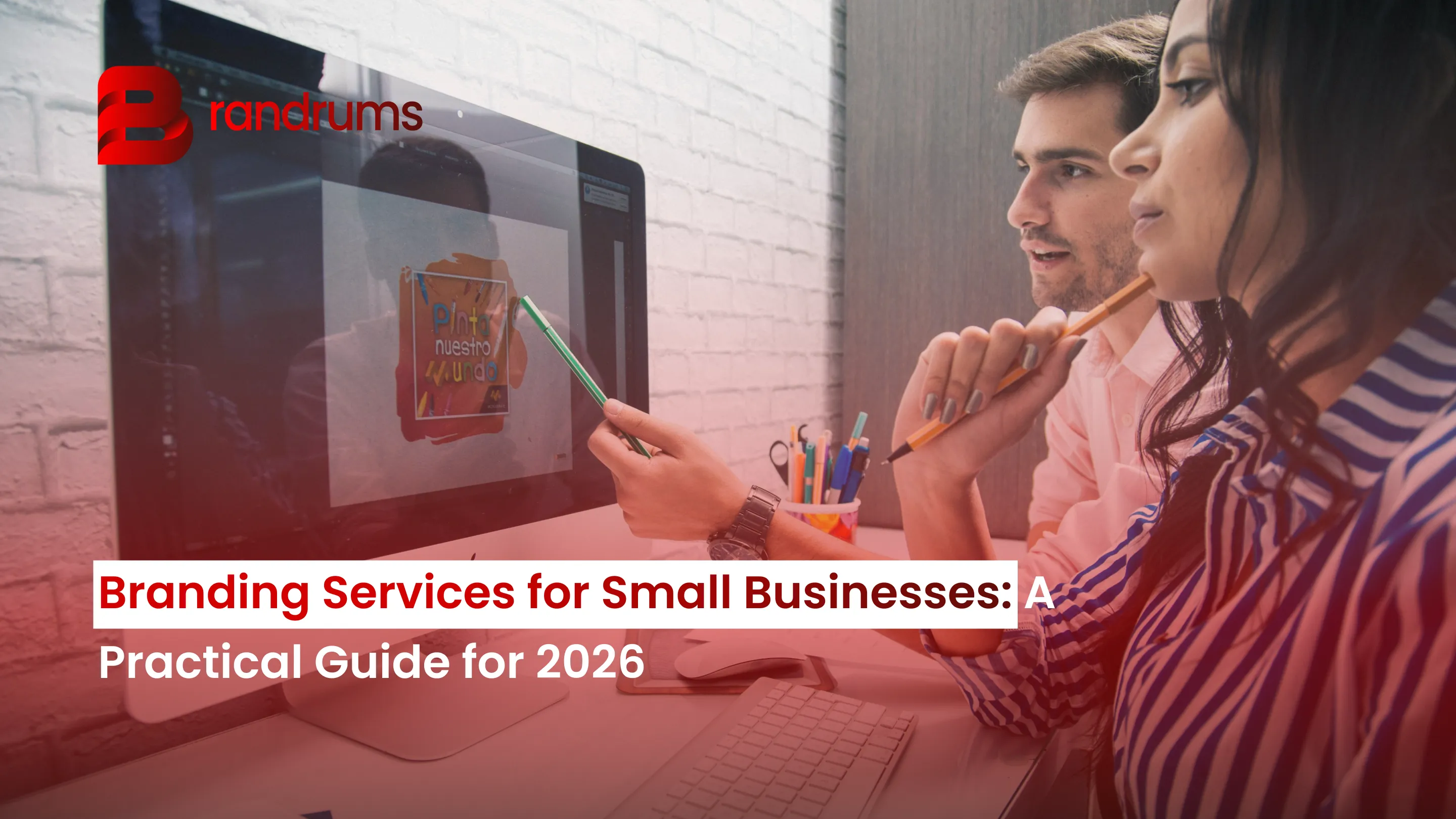 Read: Branding Services for Small Businesses: A Practical Guide for 2026 Small business owner reviewing brand guidelines and color swatches on a desk in 2026